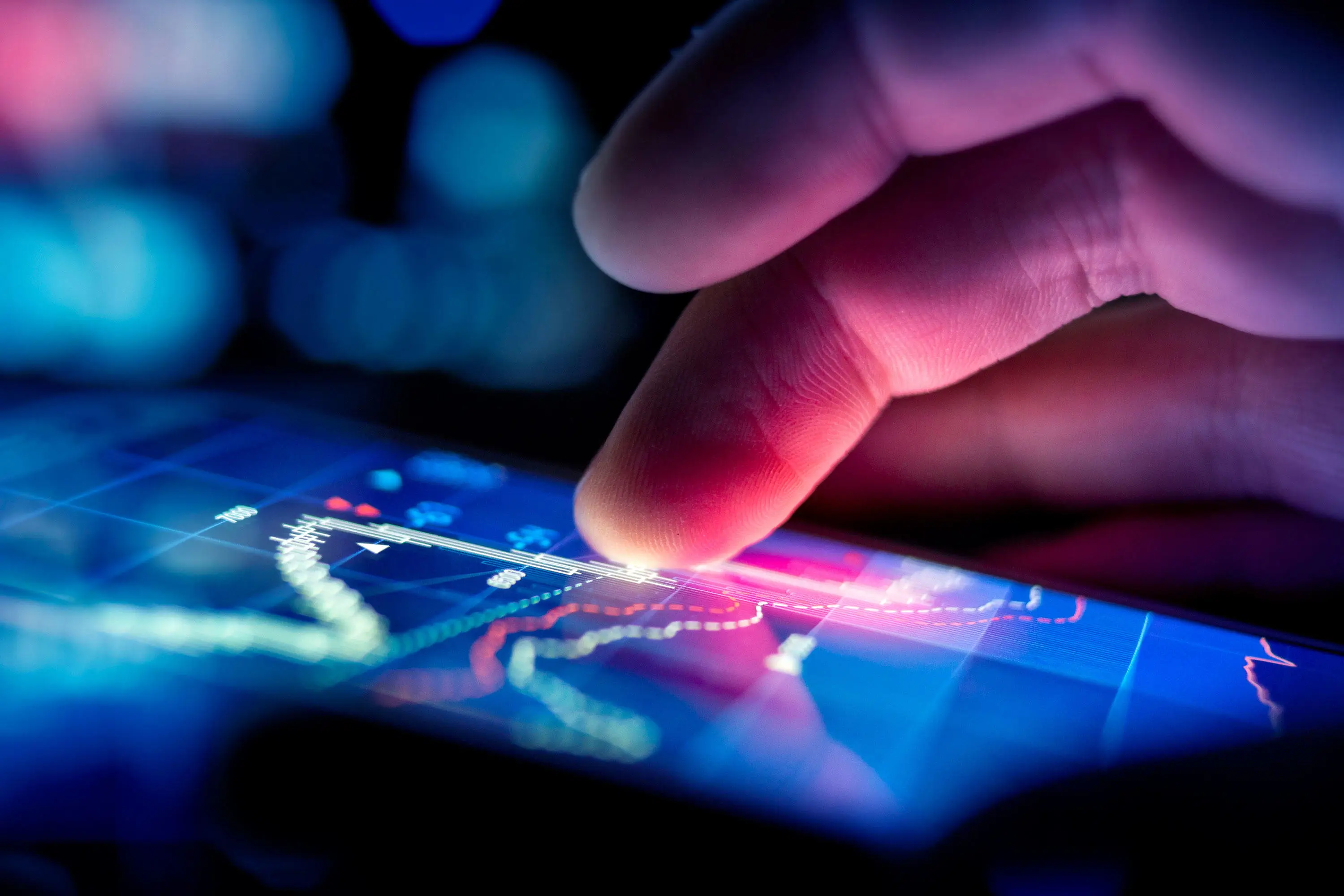 Finger touching a touchscreen device