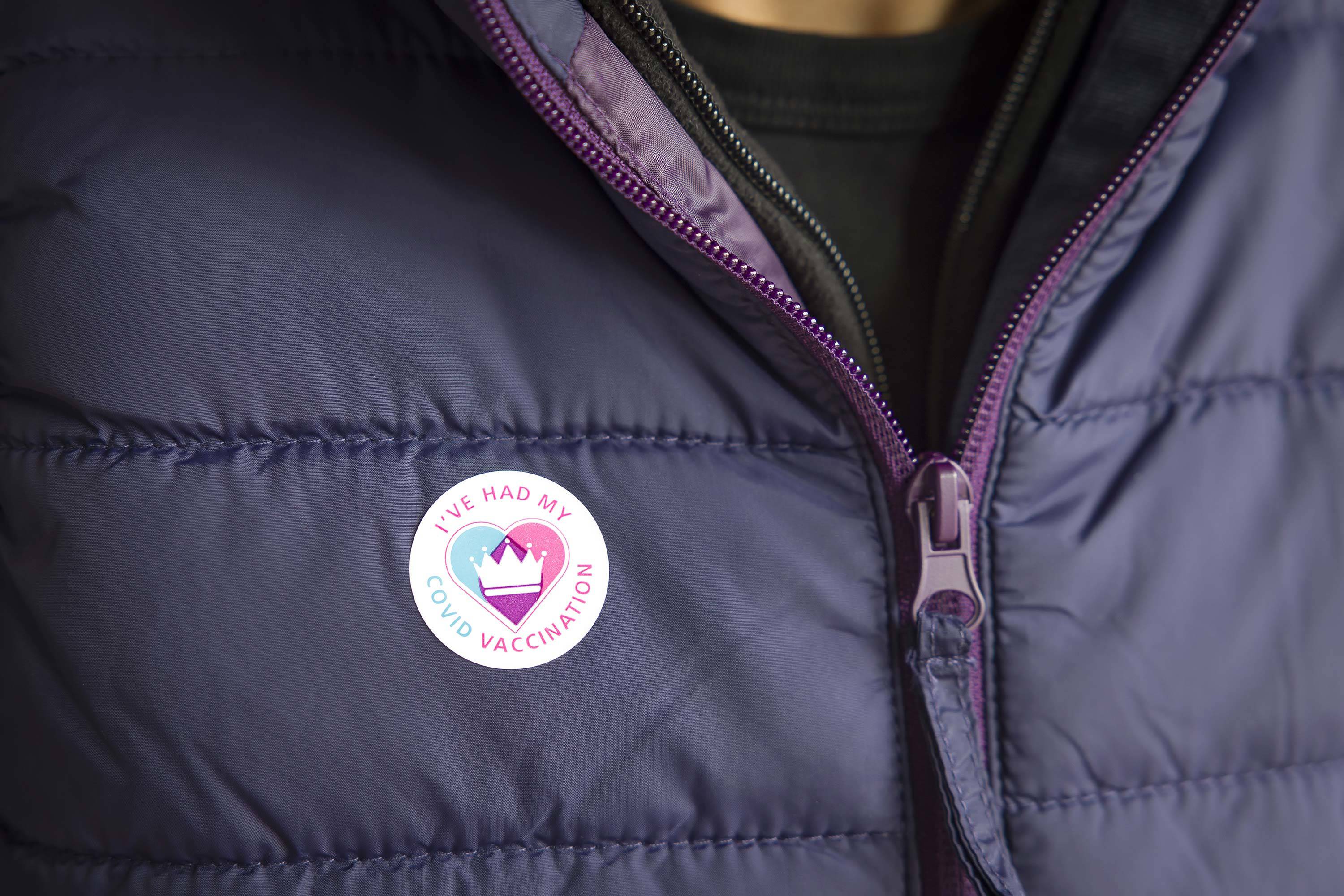 Covid vaccination sticker on jacket