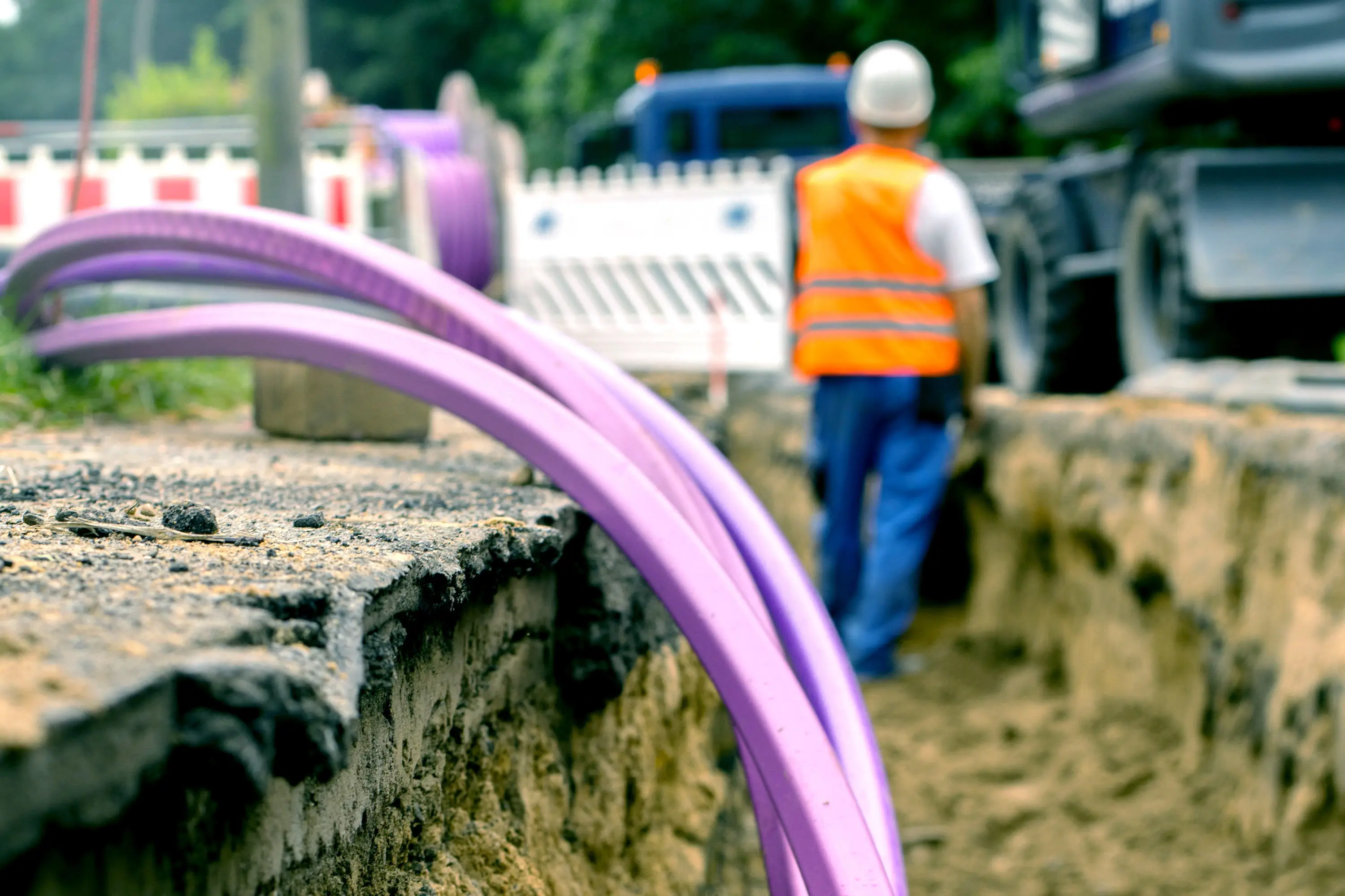 Streetworks with pipe being laid in a trench