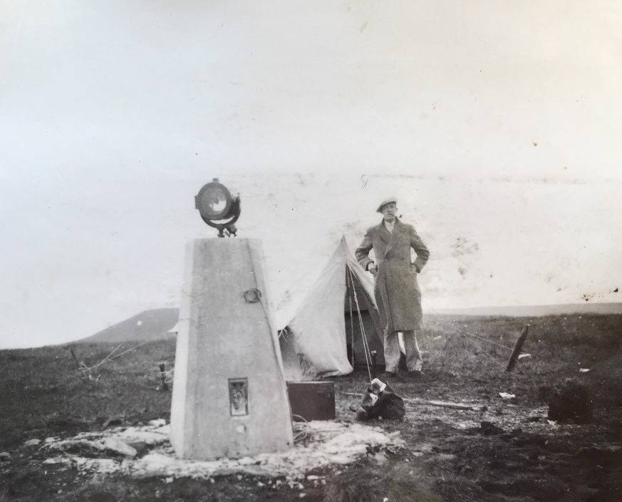 The type of beacons used and the surveyor’s tent for protection through the night