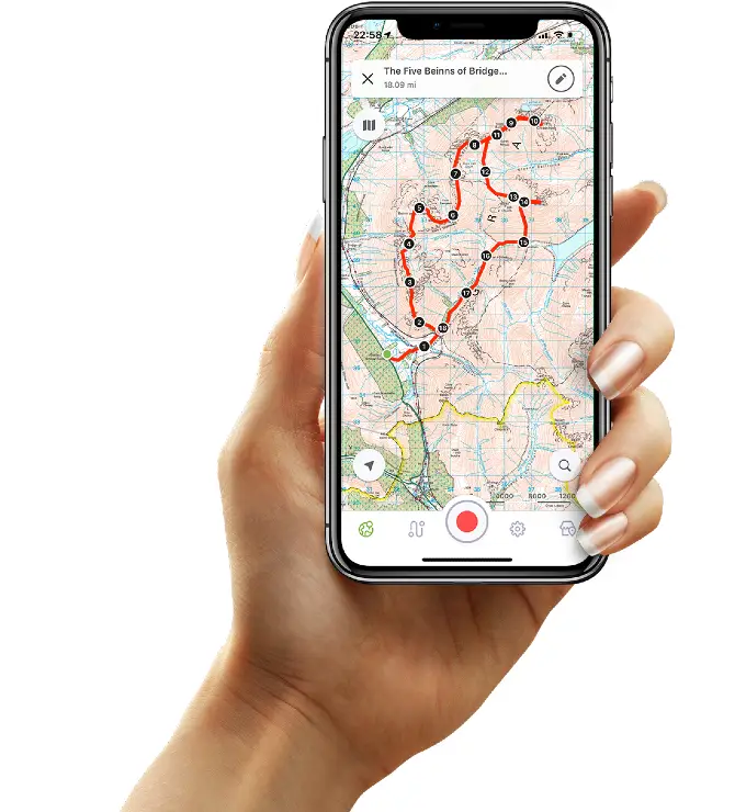 Hand holding mobile phone displaying Outdoors GPS app
