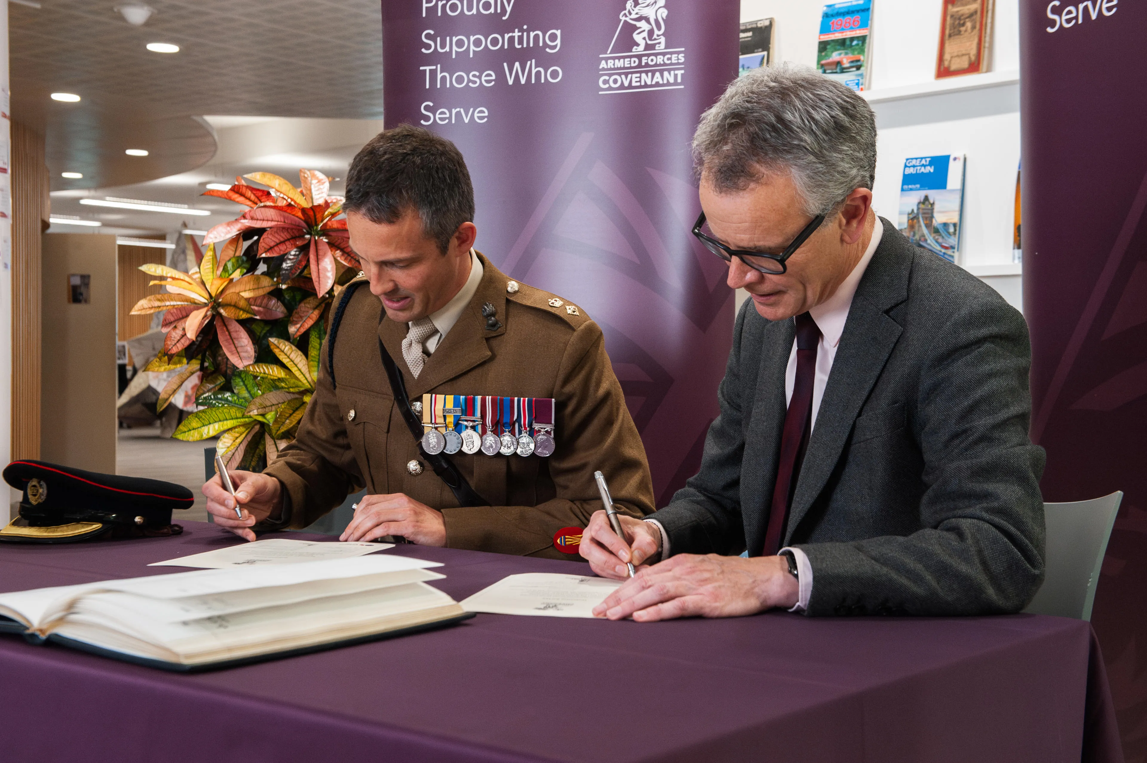 Nick Bolton, CEO of OS, signing the covenant with Lieutenant Colonel Alex Mayes, Commanding Officer 42 Engineer Regiment