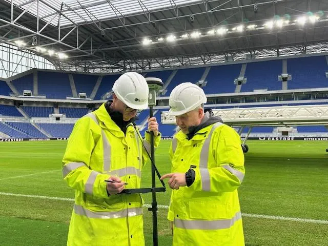 OS surveyors Stephen Cornwell and Mark Cuthbert put the final touches to surveying the new stadium.