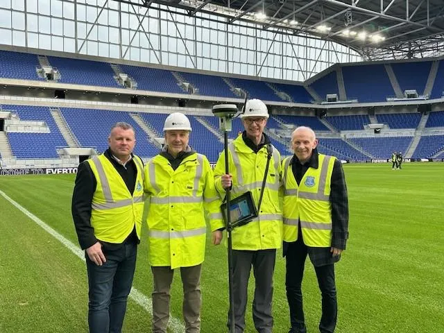 Everton club legends Graham Stuart and Peter Reid joined the OS surveyors for the occasion.
