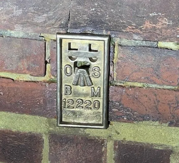 Benchmark on wall