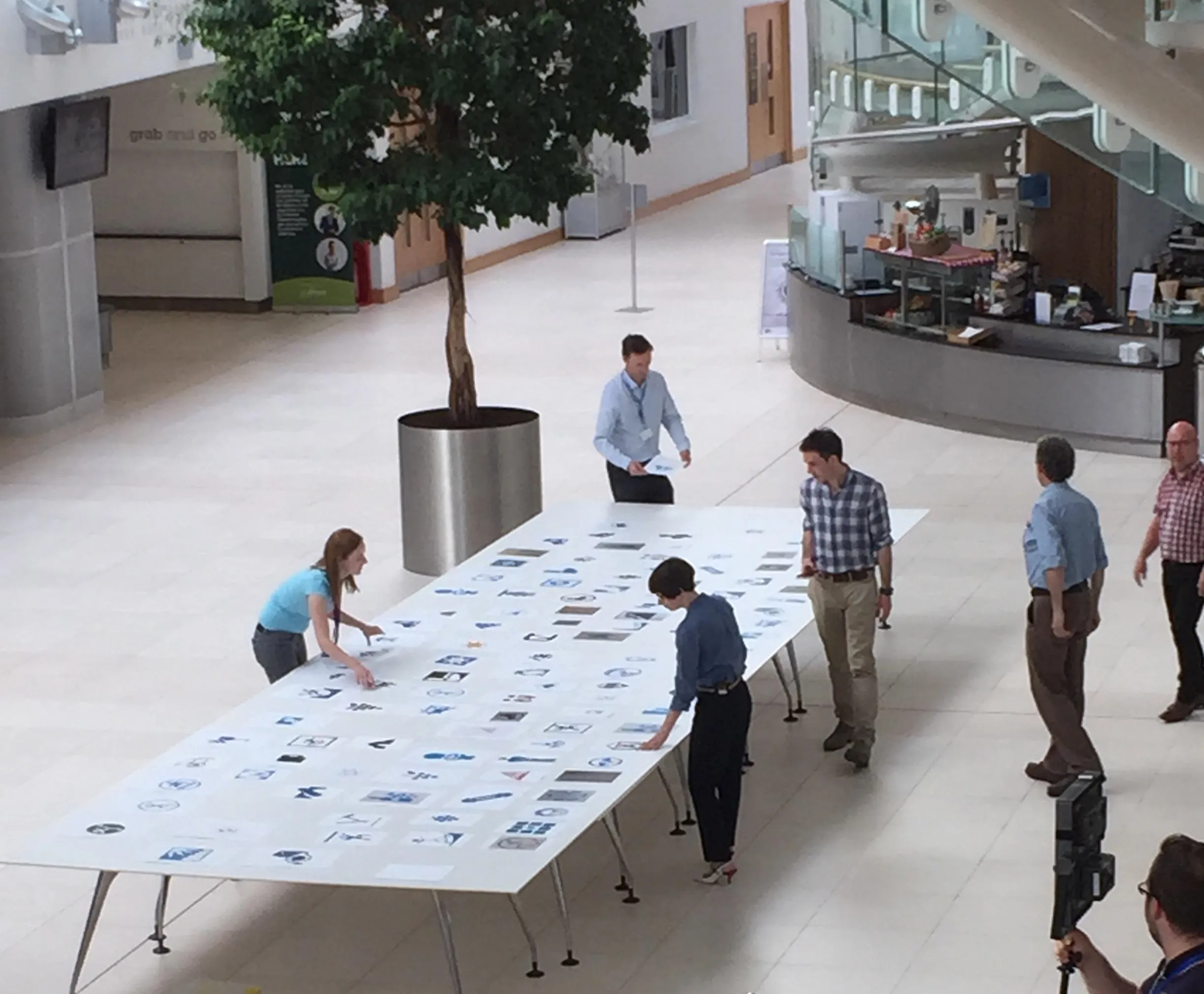 People choosing the icons at Ordnance Survey HQ