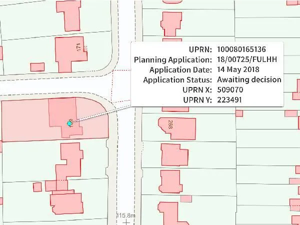 Screenshot shows a highlighted polygon and example details including UPRN