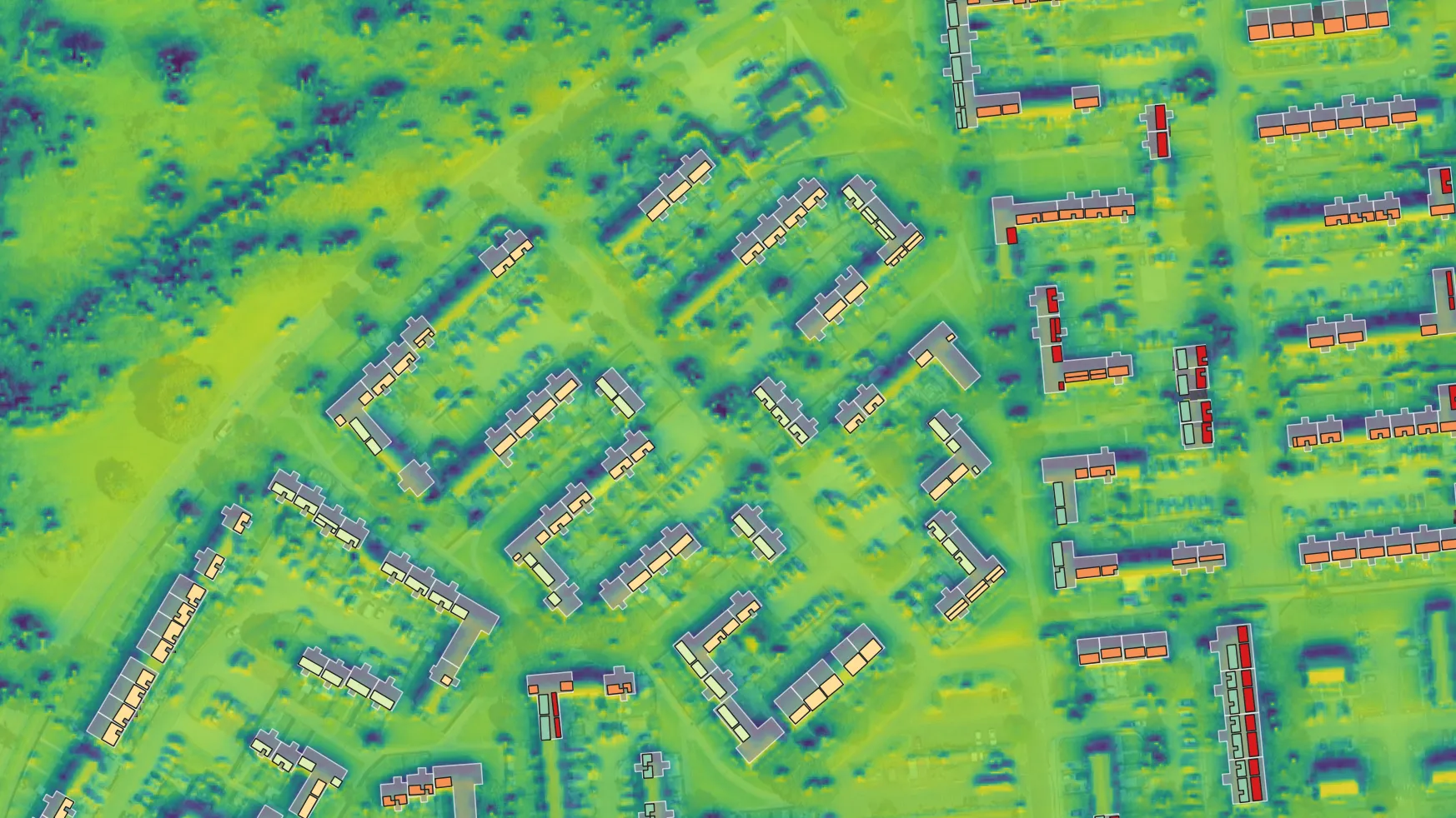 Aerial image of buildings, colour-coded from green to red scoring solar potential