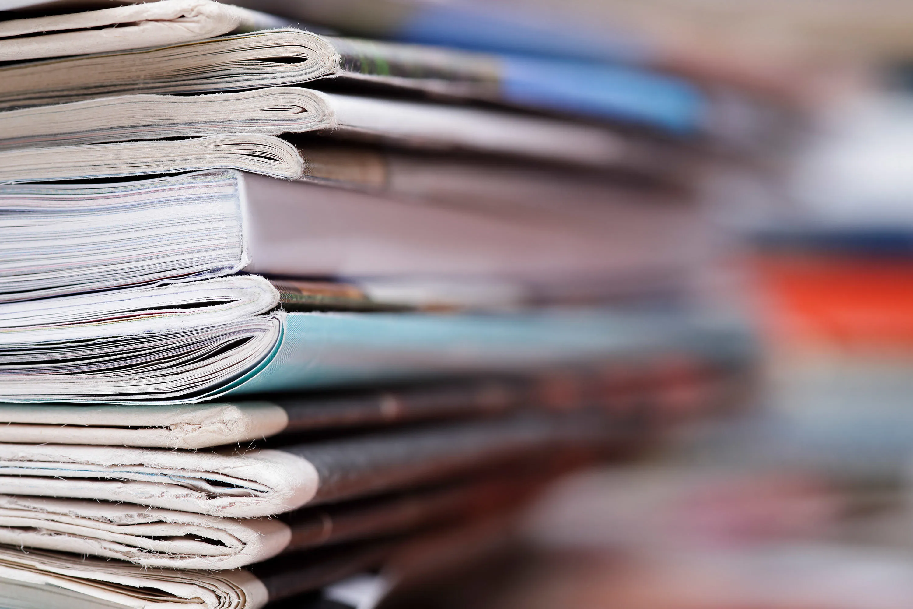 stack-of-mags-papers