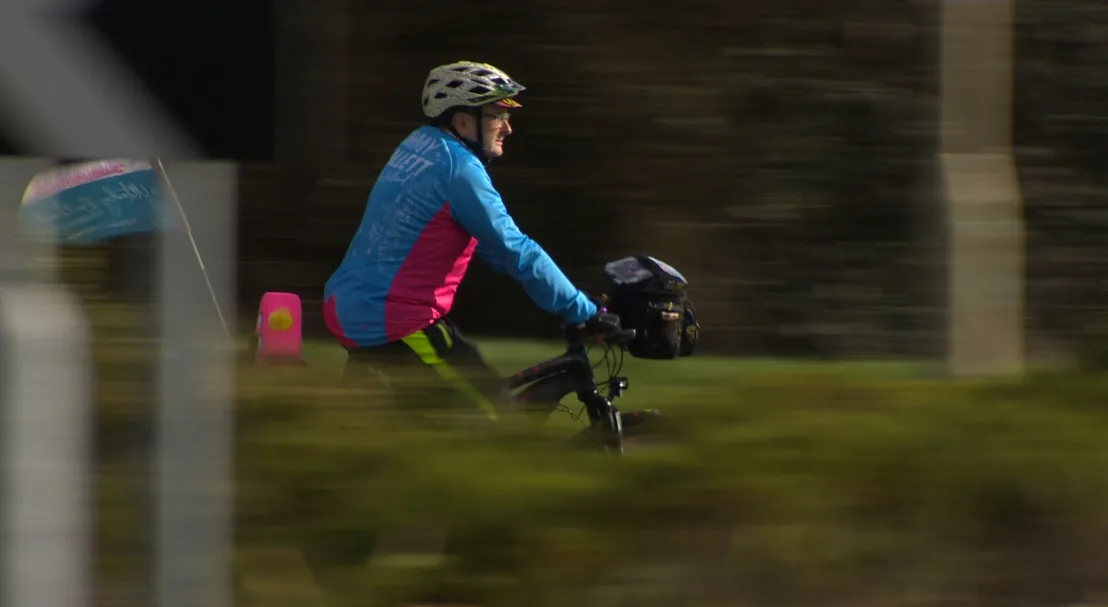 Timmy cycling outside OS headquarters in Southampton