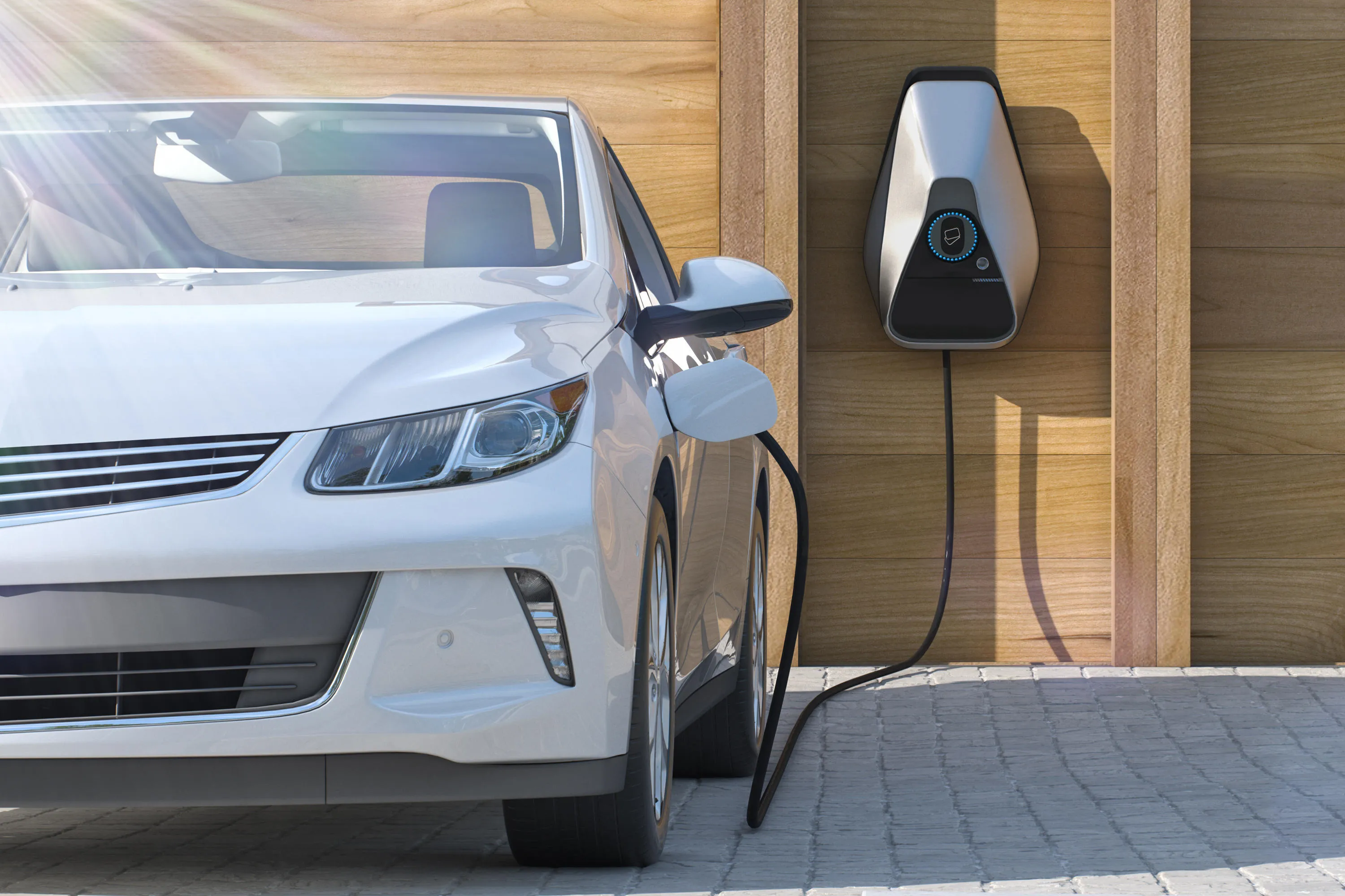 An electric car parked and plugged in